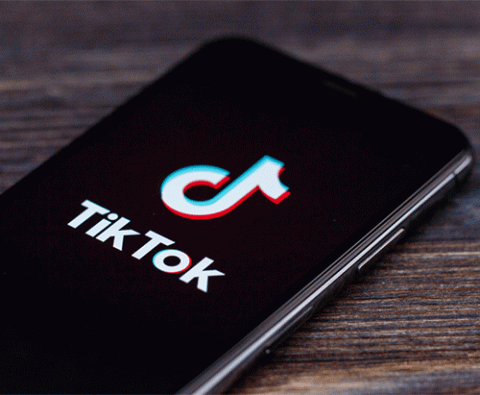 TikTok on mobile phone via Shutterstock