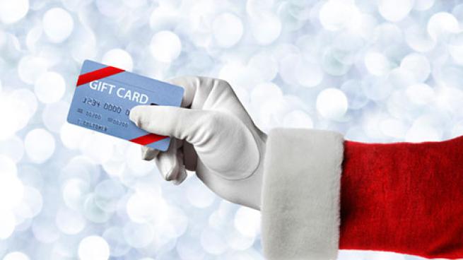 gift card in Santa's hand