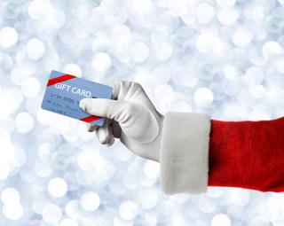 gift card in Santa's hand